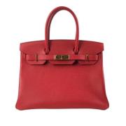 Pre-owned Leather handbags Hermès Vintage , Red , Dames