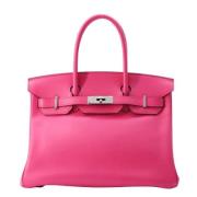 Pre-owned Leather handbags Hermès Vintage , Pink , Dames