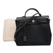 Pre-owned Canvas handbags Hermès Vintage , Black , Dames