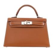 Pre-owned Leather handbags Hermès Vintage , Brown , Dames