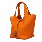 Pre-owned Leather handbags Hermès Vintage , Orange , Dames