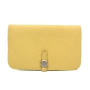 Pre-owned Leather wallets Hermès Vintage , Yellow , Dames