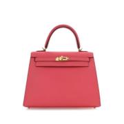 Pre-owned Leather handbags Hermès Vintage , Pink , Dames