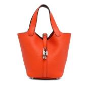 Pre-owned Leather handbags Hermès Vintage , Orange , Dames