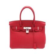 Pre-owned Leather handbags Hermès Vintage , Red , Dames