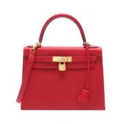 Pre-owned Leather handbags Hermès Vintage , Red , Dames