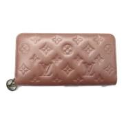 Pre-owned Canvas wallets Louis Vuitton Vintage , Pink , Dames