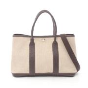 Pre-owned Canvas handbags Hermès Vintage , Beige , Dames