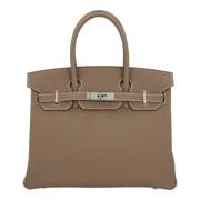 Pre-owned Leather handbags Hermès Vintage , Brown , Dames