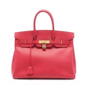 Pre-owned Leather handbags Hermès Vintage , Red , Dames