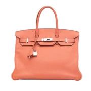 Pre-owned Leather handbags Hermès Vintage , Pink , Dames