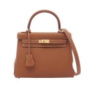 Pre-owned Leather handbags Hermès Vintage , Brown , Dames