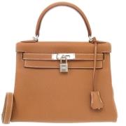 Pre-owned Leather handbags Hermès Vintage , Brown , Dames