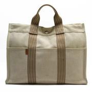 Pre-owned Canvas handbags Hermès Vintage , Beige , Unisex