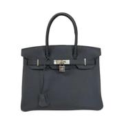 Pre-owned Leather handbags Hermès Vintage , Black , Dames