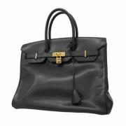 Pre-owned Leather handbags Hermès Vintage , Black , Dames