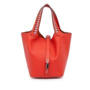 Pre-owned Leather handbags Hermès Vintage , Orange , Dames