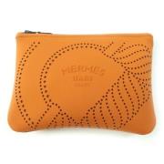 Pre-owned Canvas pouches Hermès Vintage , Orange , Dames