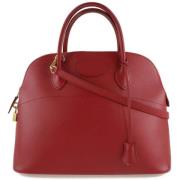 Pre-owned Leather handbags Hermès Vintage , Red , Dames