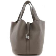 Pre-owned Leather handbags Hermès Vintage , Gray , Dames