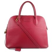 Pre-owned Leather handbags Hermès Vintage , Red , Dames