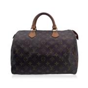 Pre-owned Canvas handbags Louis Vuitton Vintage , Brown , Dames