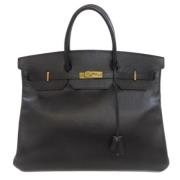 Pre-owned Leather handbags Hermès Vintage , Black , Dames