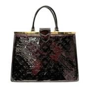 Pre-owned Leather handbags Louis Vuitton Vintage , Red , Dames