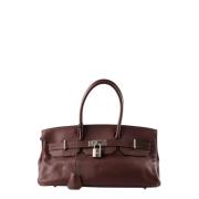 Pre-owned Leather handbags Hermès Vintage , Brown , Dames