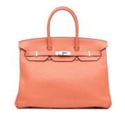 Pre-owned Leather handbags Hermès Vintage , Orange , Dames