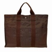 Pre-owned Canvas handbags Hermès Vintage , Brown , Unisex