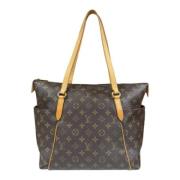 Pre-owned Canvas shoulder-bags Louis Vuitton Vintage , Brown , Dames