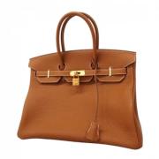 Pre-owned Leather handbags Hermès Vintage , Brown , Dames