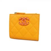 Pre-owned Leather wallets Chanel Vintage , Orange , Dames