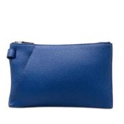 Pre-owned Leather clutches Hermès Vintage , Blue , Dames