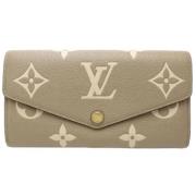 Pre-owned Leather wallets Louis Vuitton Vintage , Beige , Dames