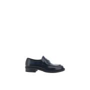 Gestikte leren loafers met driehoekige plaque Prada , Black , Heren