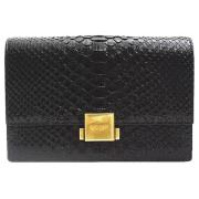 Pre-owned Leather clutches Yves Saint Laurent Vintage , Black , Dames