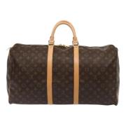 Pre-owned Canvas handbags Louis Vuitton Vintage , Brown , Unisex