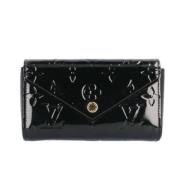 Pre-owned Fabric clutches Louis Vuitton Vintage , Black , Dames