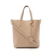 Pre-owned Leather handbags Yves Saint Laurent Vintage , Beige , Dames