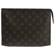 Pre-owned Canvas clutches Louis Vuitton Vintage , Brown , Dames