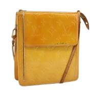 Pre-owned Leather pouches Louis Vuitton Vintage , Yellow , Dames