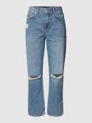 Low rise jeans in destroyed-look