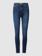 High rise skinny fit jeans met labeldetail