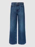 High rise relaxed fit jeans met merkdetail