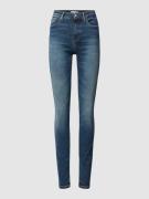 Slim fit jeans met labeldetails, model 'COMO'