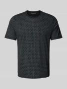 T-shirt met all-over logoprint