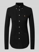 Poloshirt met button-downkraag.