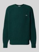 Gebreide pullover van wol met logopatch, model 'BEADED'